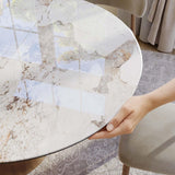 Modern Extendable Dining Table for 4-6, 47" to 63" Round to Oval Sintered Stone Kitchen Table with Carbon Steel Base