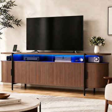 69" Mid Century Modern TV Stand, Curved Entertainment Center with LED Light & Power Outlet, Fluted Wood TV Stand for TVs up to 80'',Media TV Console Table with Sliding Doors for Living Room, Walnut