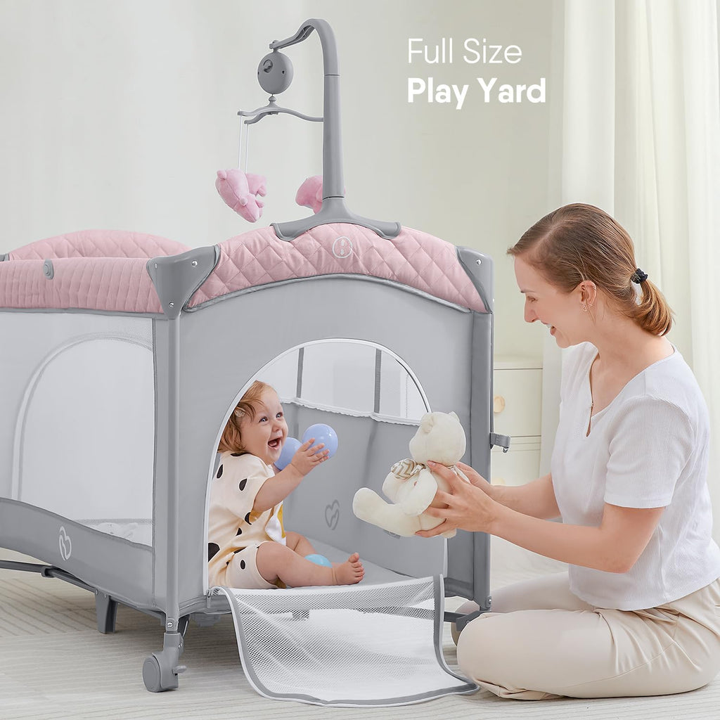 Baby Bassinet Bedside Crib, Pack and Play with Mattress, Diaper Changer and Playards from Newborn to Toddles,Pink
