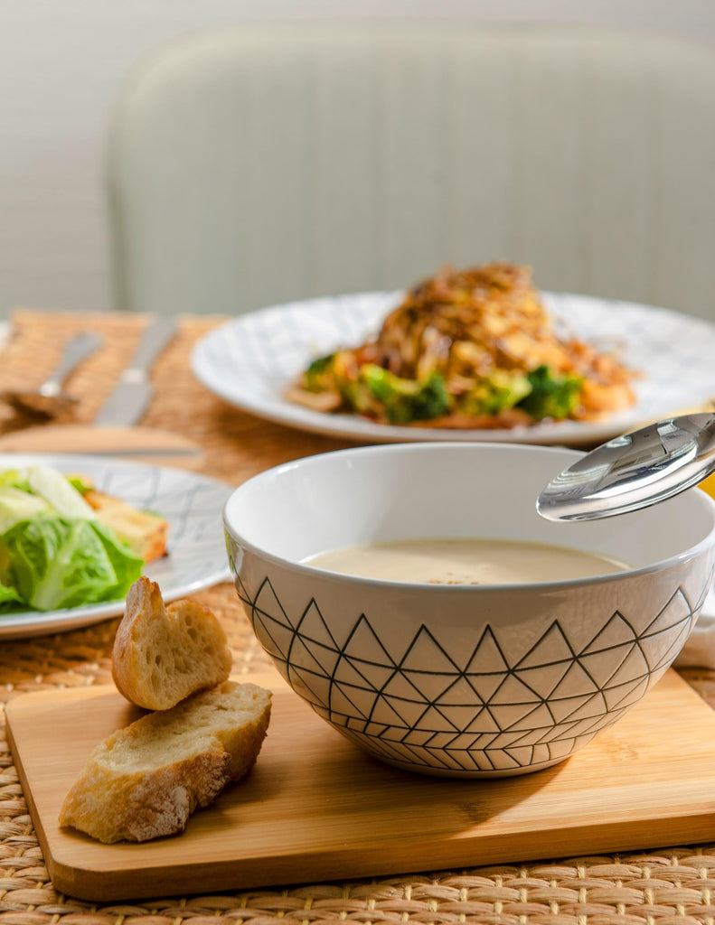 12 Piece Ceramic Dinnerware Set Modern Contemporary Design Plates and Bowls for Dining Glossy White Stoneware Dishes