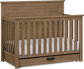Simmons Kids Caden 6-in-1 Convertible Crib with Trundle Drawer, Greenguard Gold Certified, Aged Oak