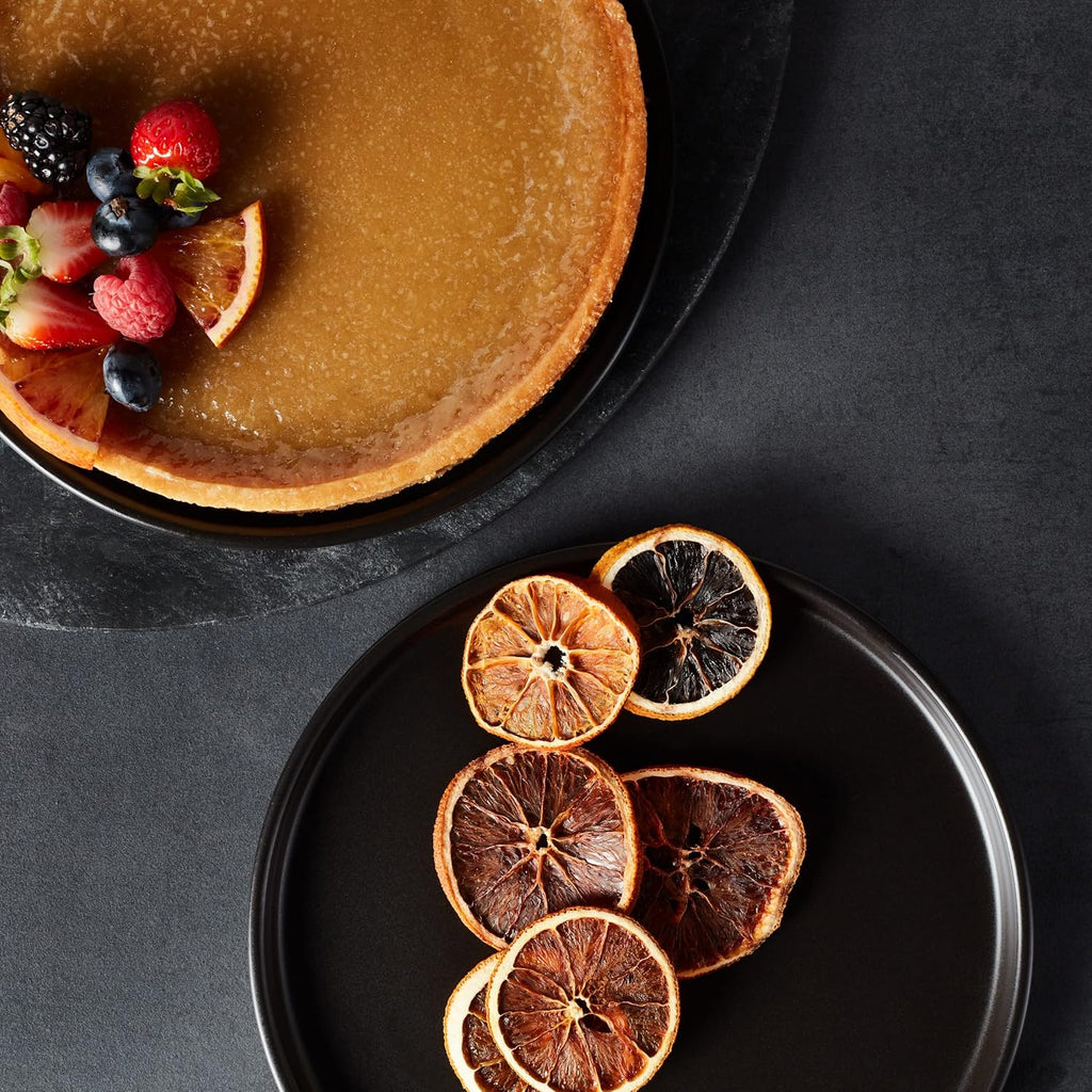 Celina Stoneware 16 Piece Modern Dinnerware Set, Plates and Bowls, Black Matte, Service for 4
