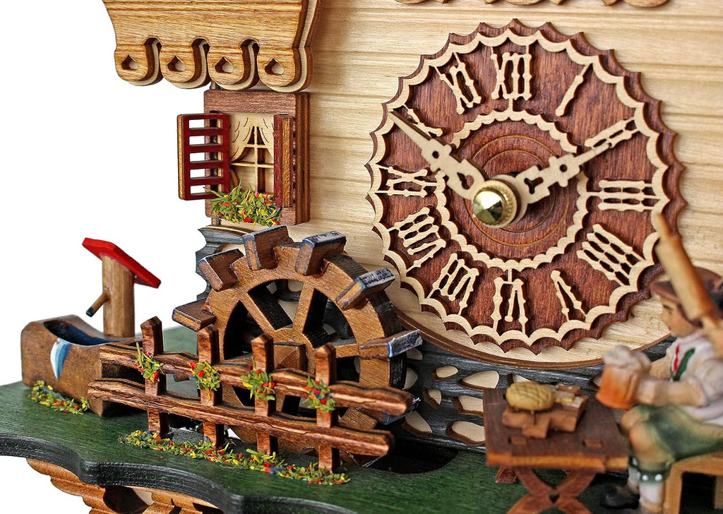 Trenkle Quartz Cuckoo Clock Black Forest House with Moving Black Forest Woman and Mill Wheel, with Music TU 4215 QM