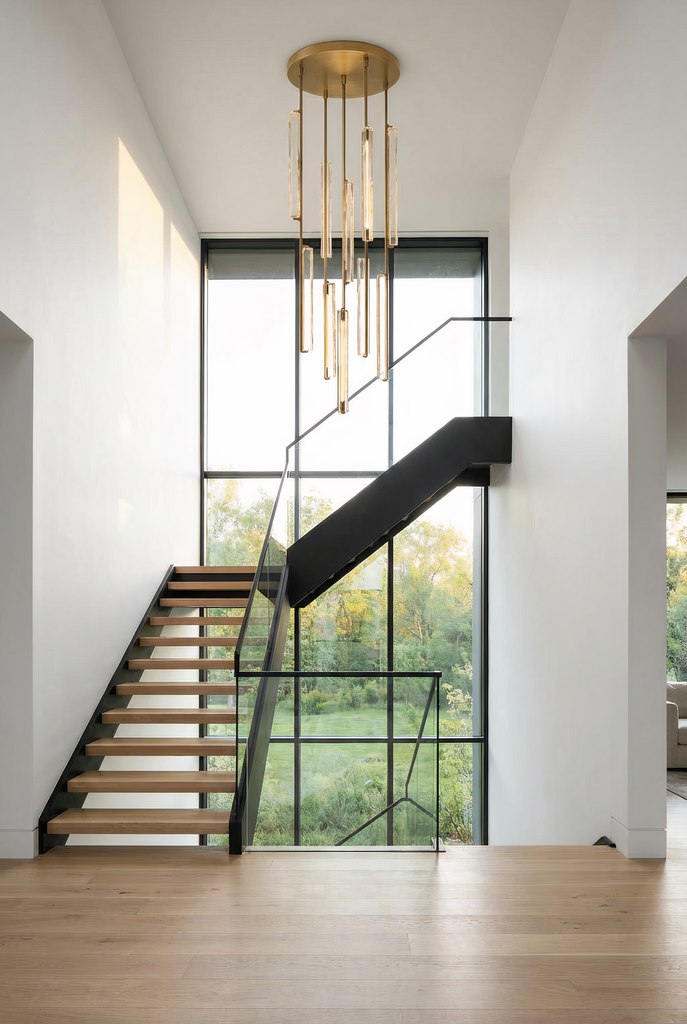 Inspired Audubon Style Crystal Round Chandelier 24.5" - Lacquered Burnished Brass in Stairwell Setting