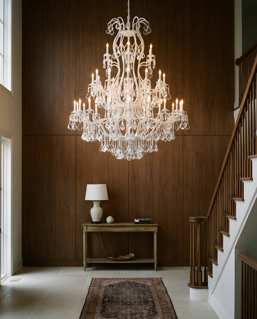 White Wrought Iron Chandelier against walnut wood wall